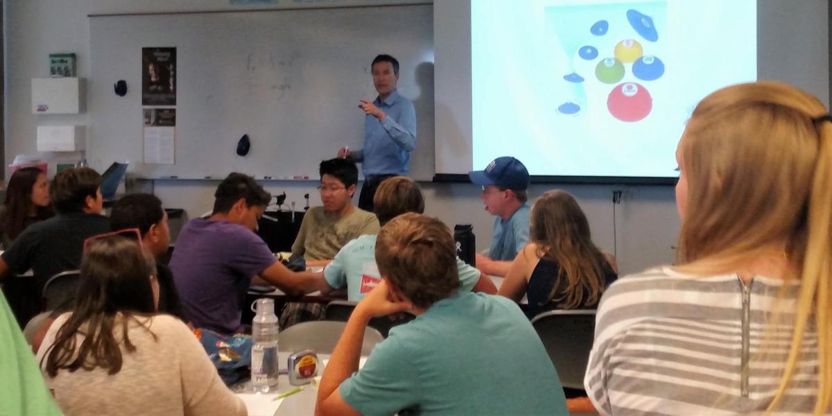 Greg Rieker teaching a group of students