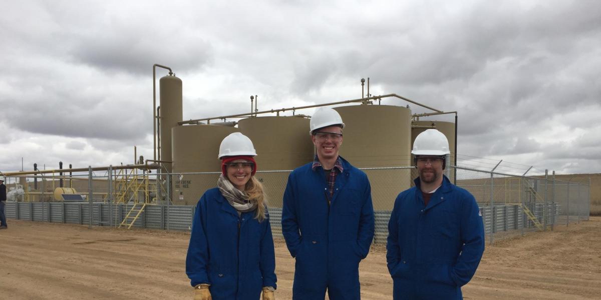 Greg Rieker and students on site at storage tank facilities