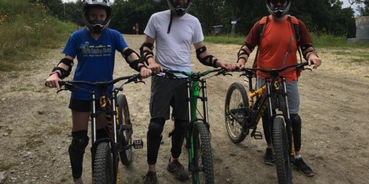 Greg Rieker and a couple of his students on mountain bikes
