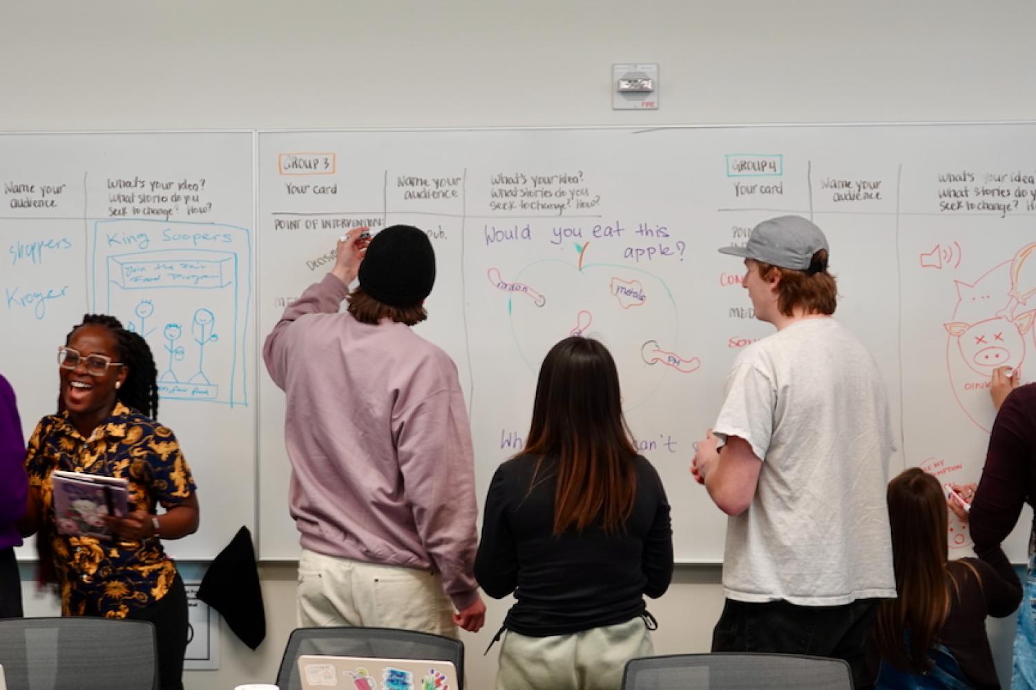 people collaborating and laughing at a SAS lab event