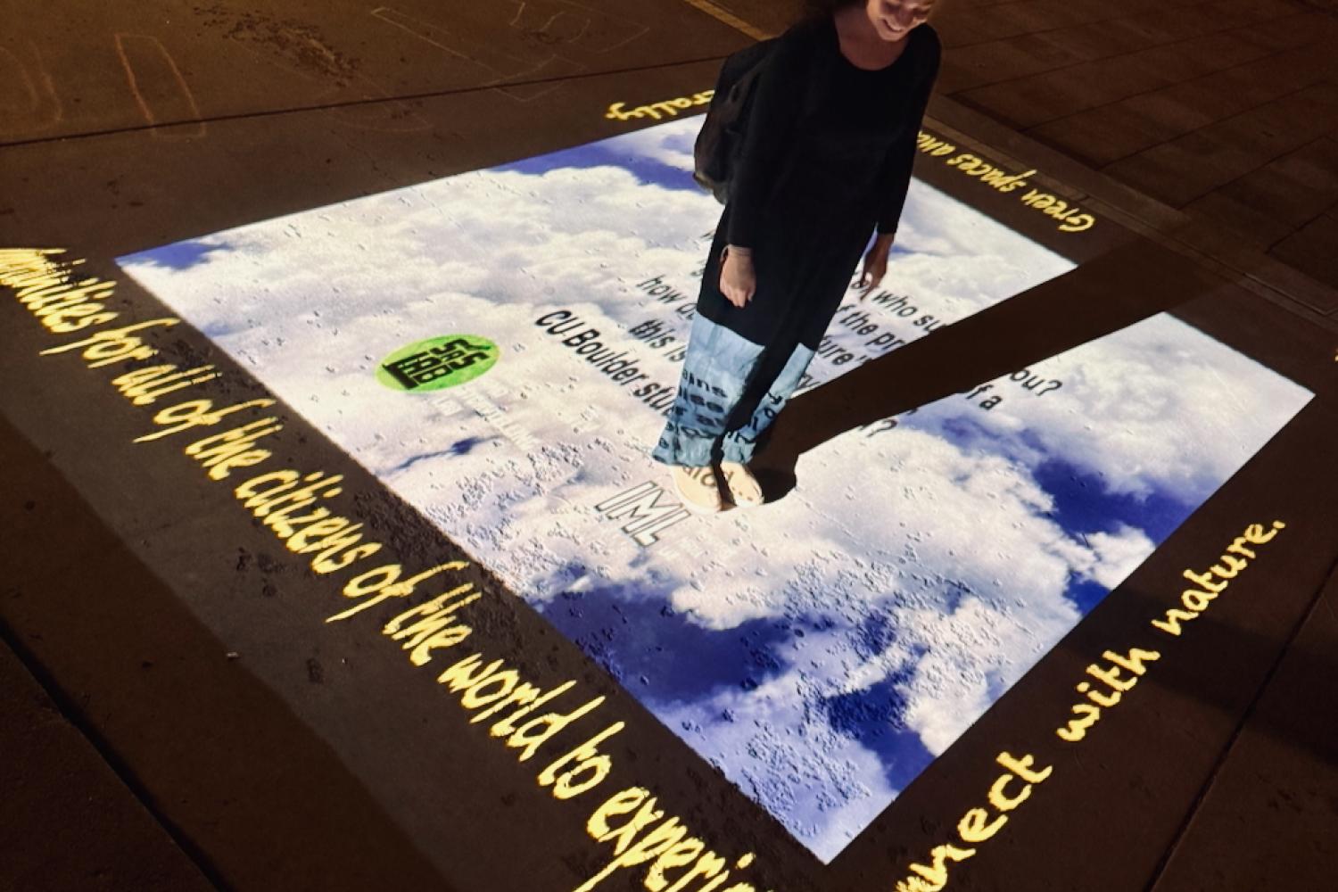 student standing in hologram