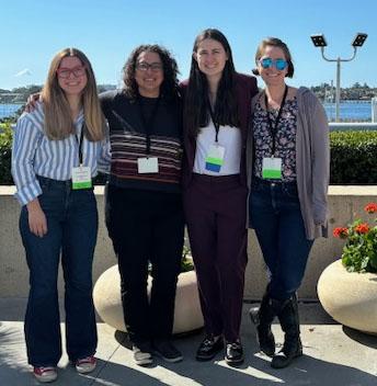 Lab members Charlotte Moser, Tiffany Ito, Emily Brown, and Chelsea Taylor attending the SPSP conference in 2024.
