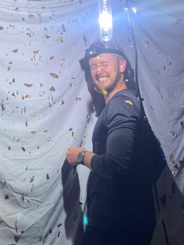 Christian Couch in front of a moth sheet