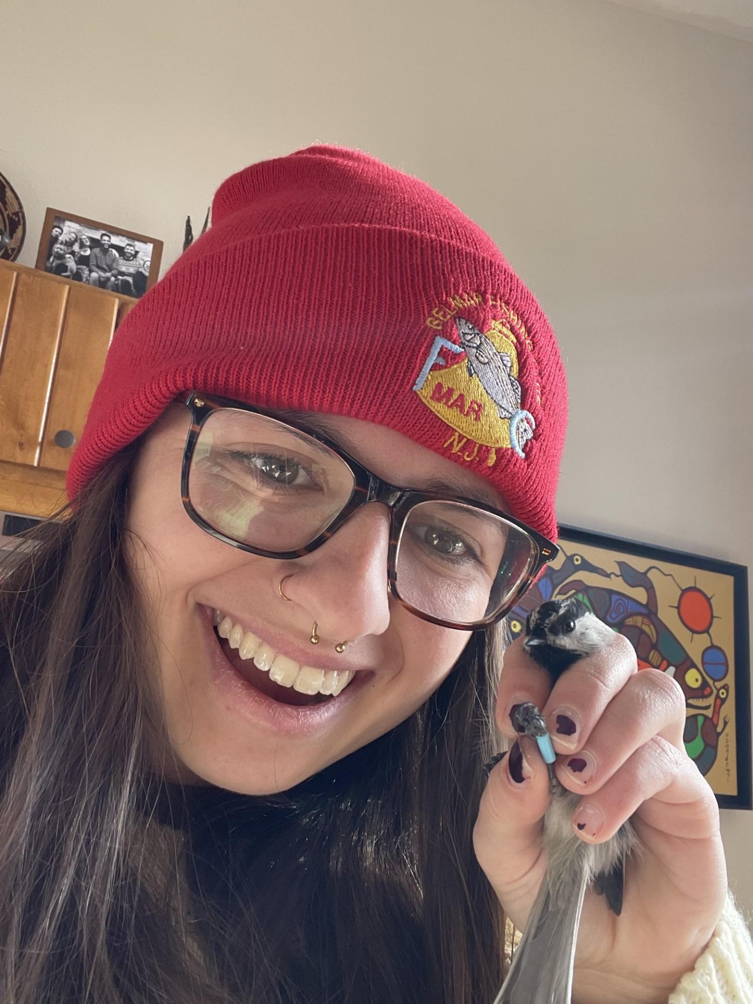 sara with chickadee