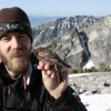 Erik with a rosy finch