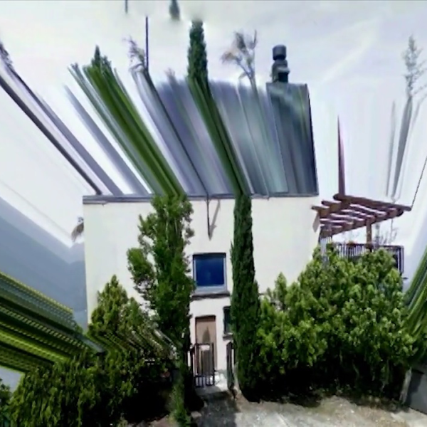 a small building surrounded by green plants and bushes, the image is glitched and blurs out toward the sky.