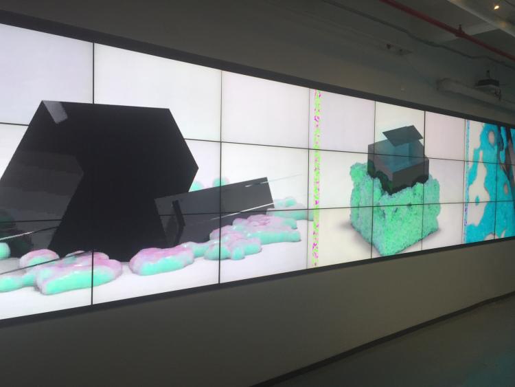 digital exhibition depicting foam, and random objects on a colorful background.
