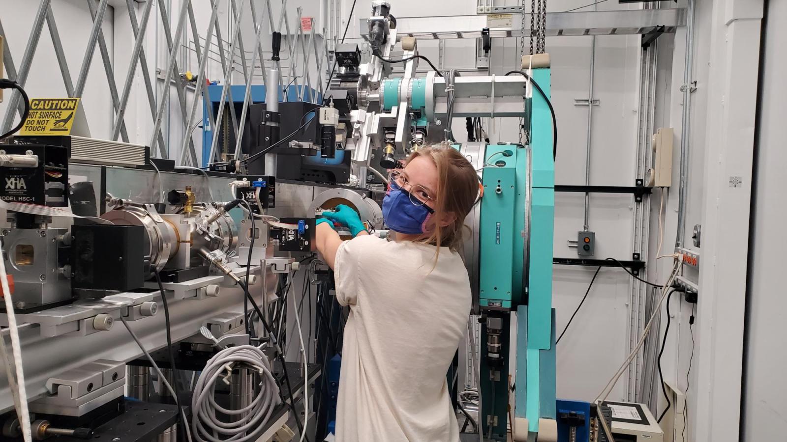 Lacey working on a beamline