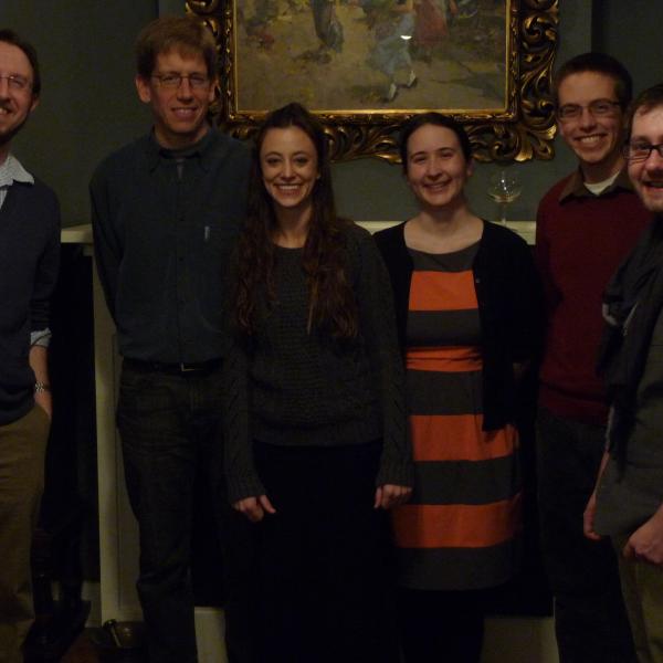 Vaida group standing together at the holiday party