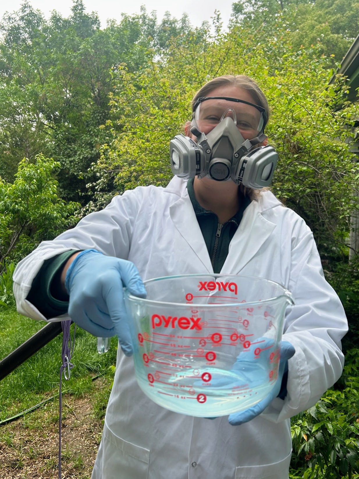 Darrah Boyle with bleach solution during the CLEAN home field campaign