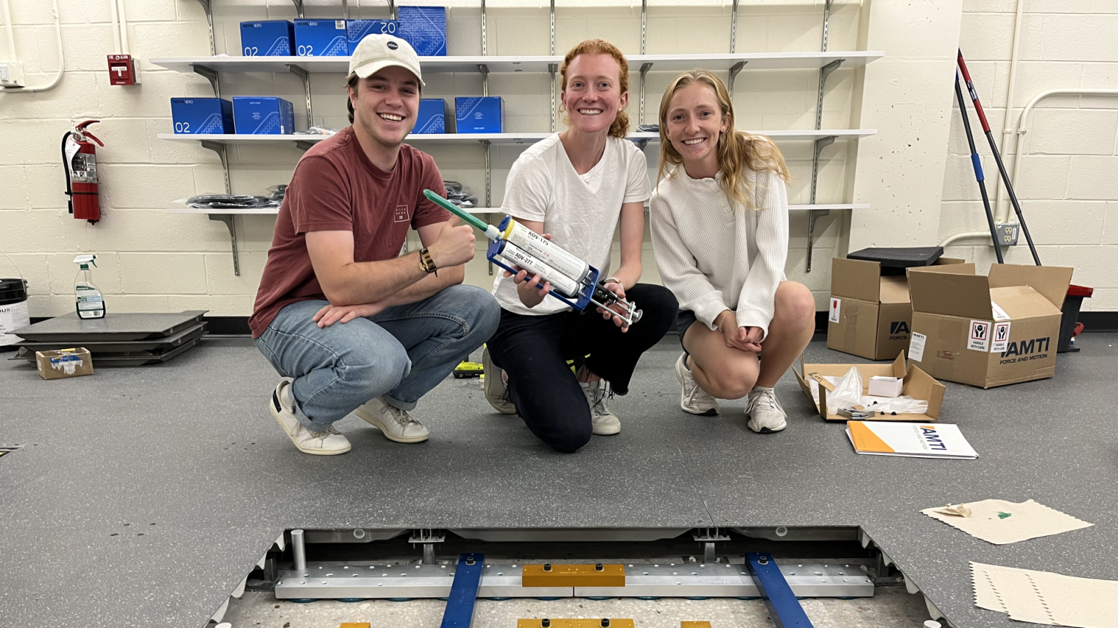 Lab Members Epoxying Forceplates