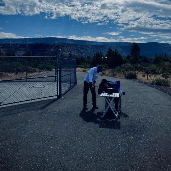 Mark Lofquist, Thomas Brinkoetter surveying Hat Creek Radio Observatory using CU PASS noise sensor attached to drone. August 2022.