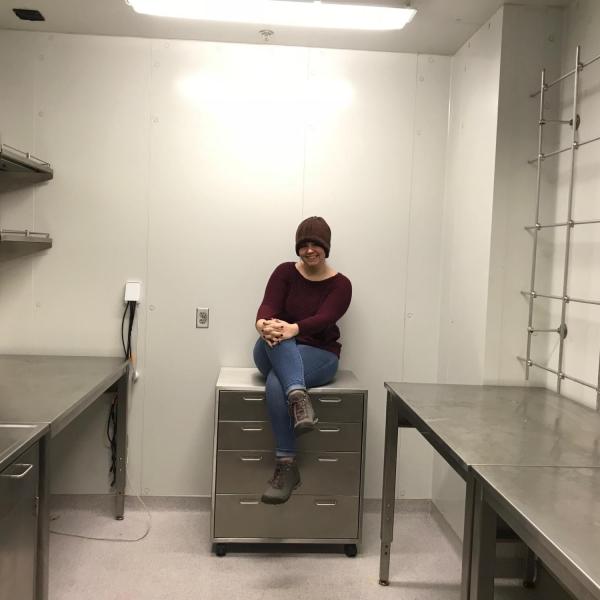 Aly poses - the cold room is pristine