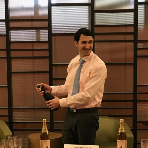 Torey defends and pops the cork!