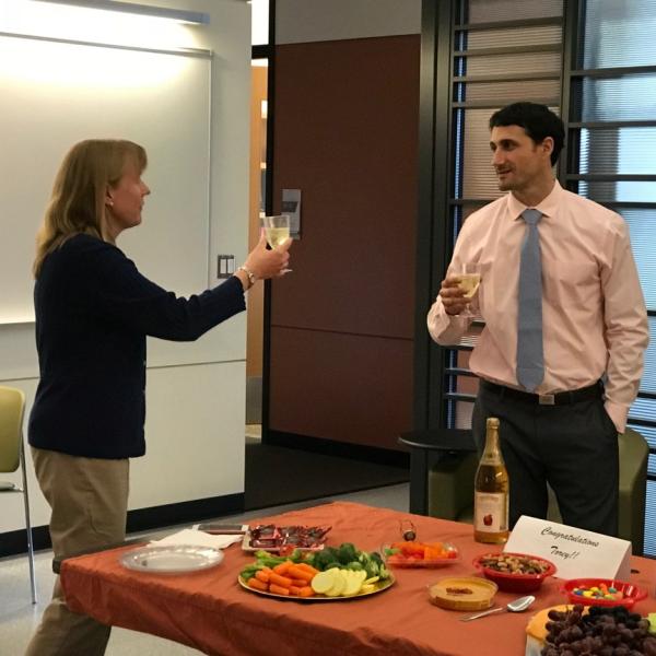 Debbie gives Torey a toast