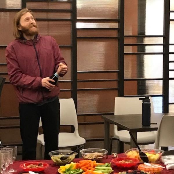 Nick defends and pops the cork!