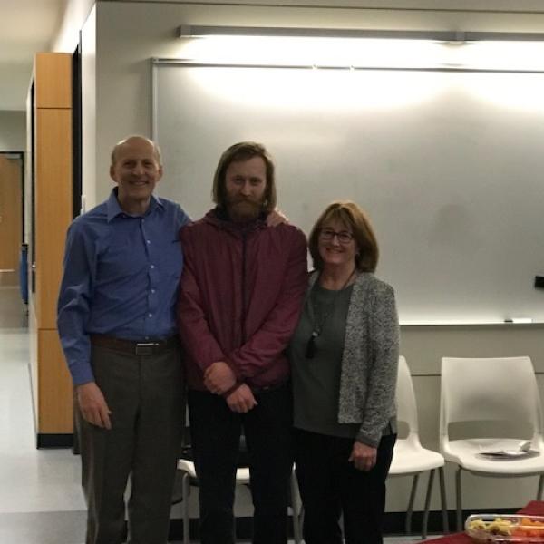 Nick poses with his proud parents