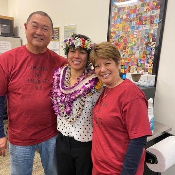 Meagan poses with proud parents