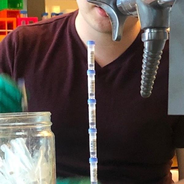 Nick balances a bunch-o tubes