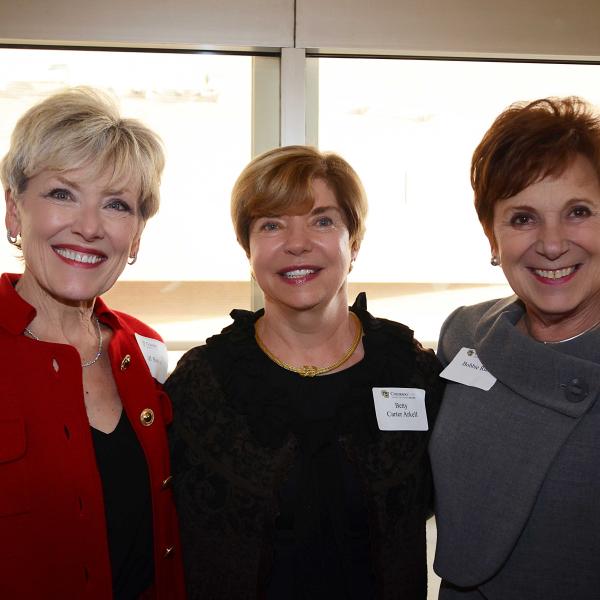 Three women at award banquet