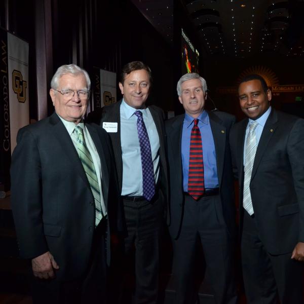 Gov. Roy Romer ('52), Doug Friednash, Michael Carrigan ('94), and Joe Neguse ('09)