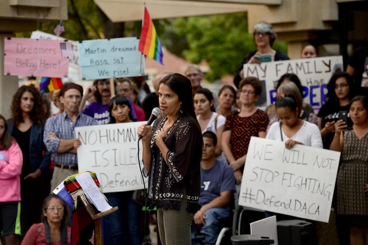 Professor Violeta Chapin speaks during a DACA rally in Longmont.