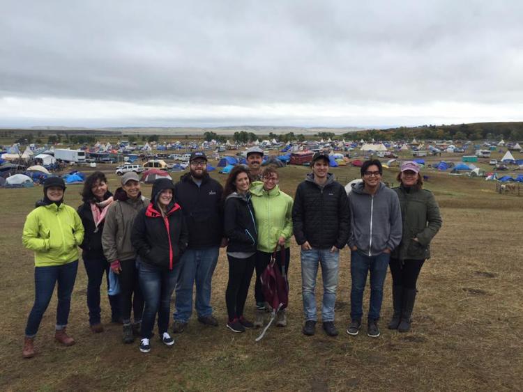 Associate Clinical Professor Carla Fredericks with American Indian Law Clinic students at the Oceti Sakowin Camp in North Dakota