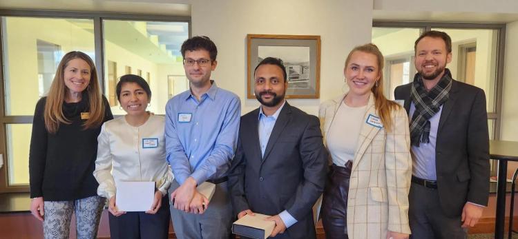 1st Place: Shayan Abtahi (Law), Lucia Jayne (Computer Science), Yamineesh Kanaparthy (Business Analytics) and Sarah Sorenson (Law)