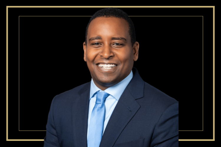 Joe Neguse headshot on graphic background