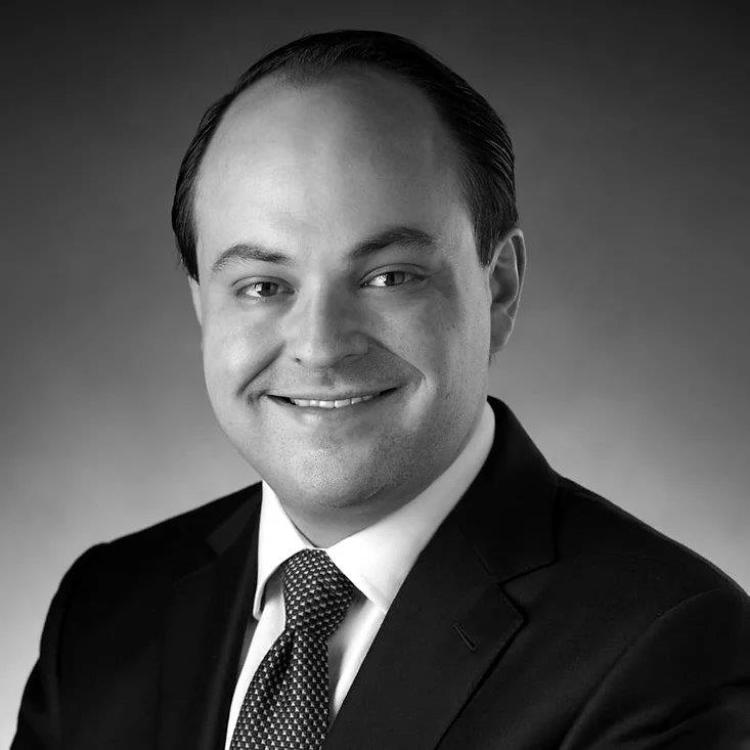 Black and white headshot of Joel Pratt