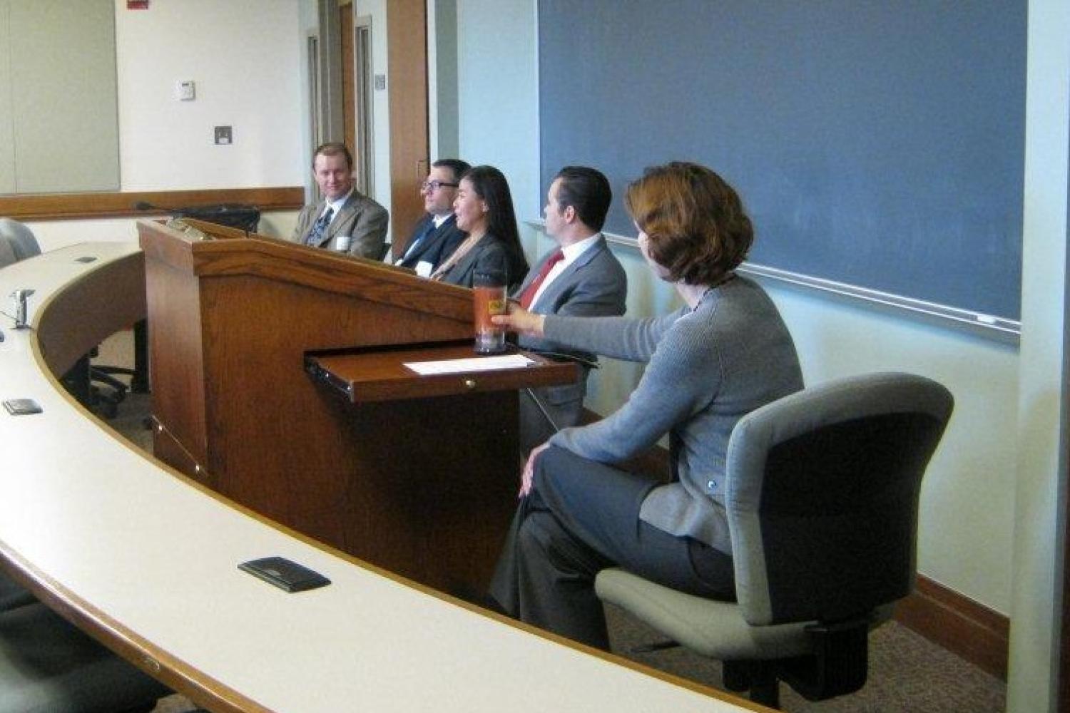 Judge John Madden (Denver District Court), Zach Carlyle (U.S. SEC), Misae Nishikura (Holland & Hart), and Dan McCormick (Kilpatrick Townsend) speak at the Interviewing Tips and Techniques Panel while Jennifer Winslow moderates.
