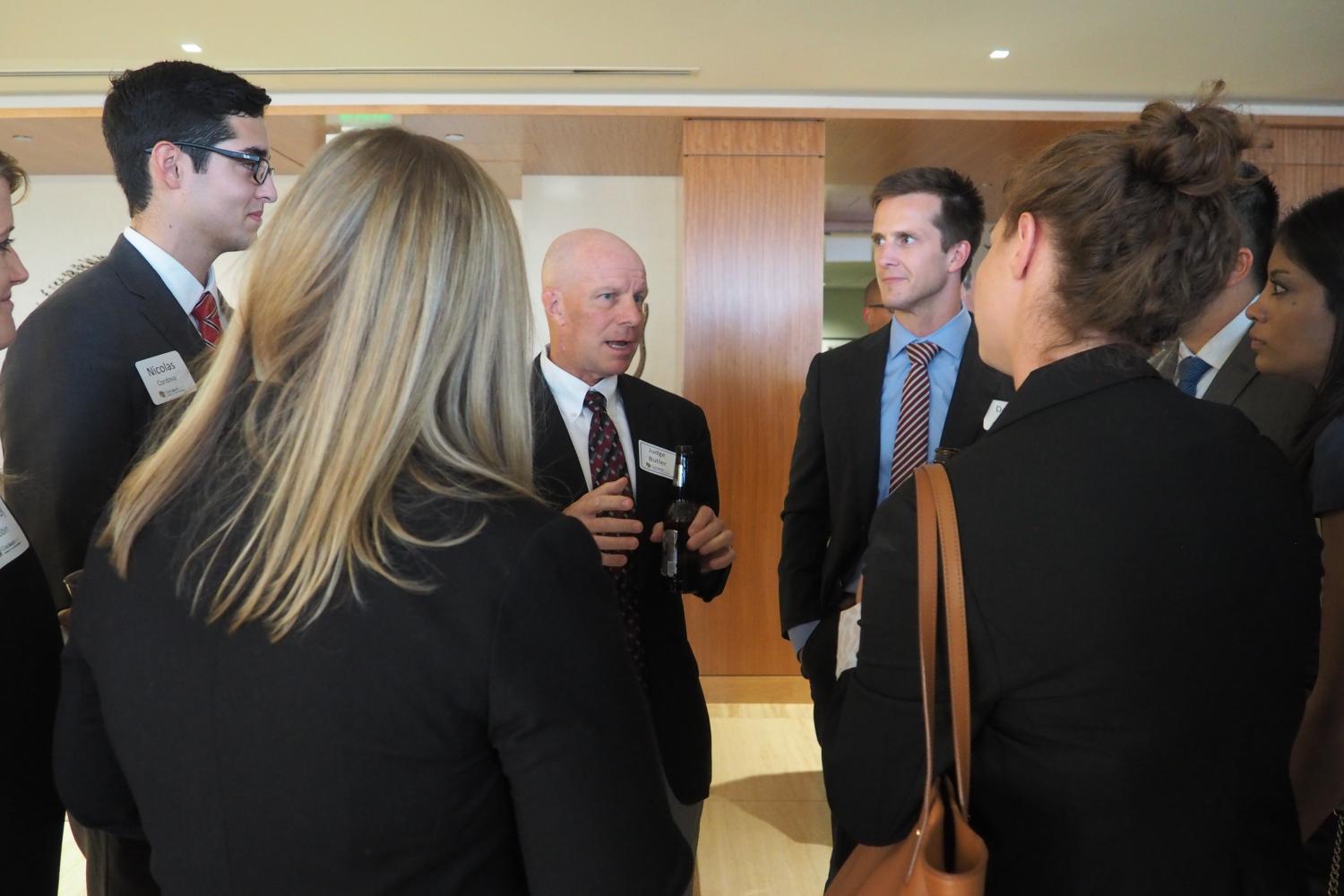 Judge Butler chatting with students