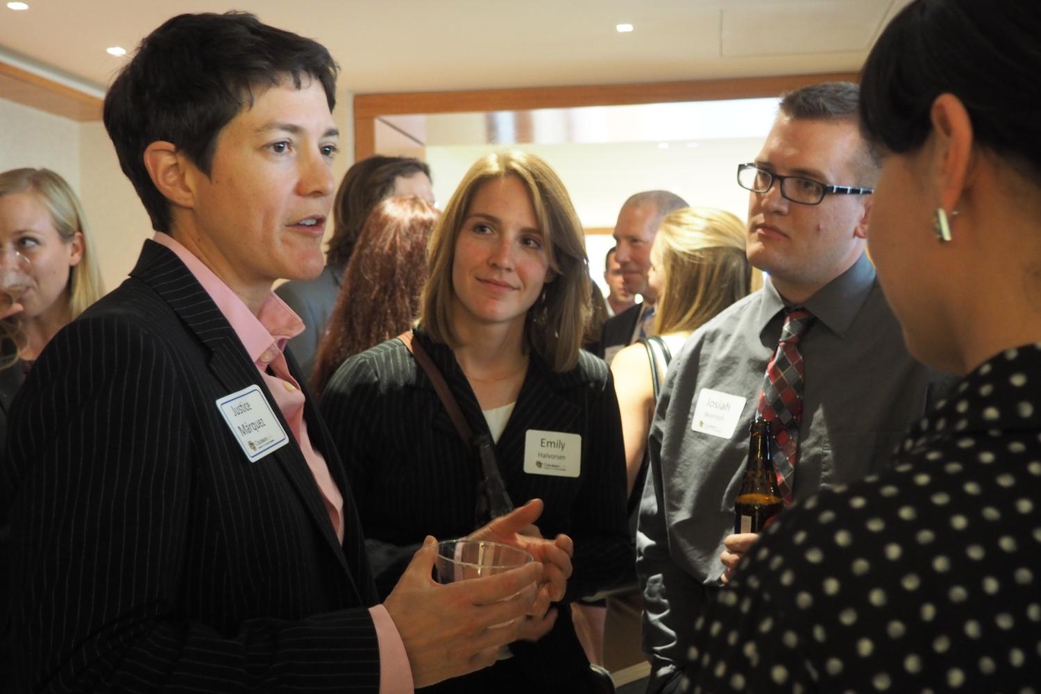 Justice Márquez chatting with students