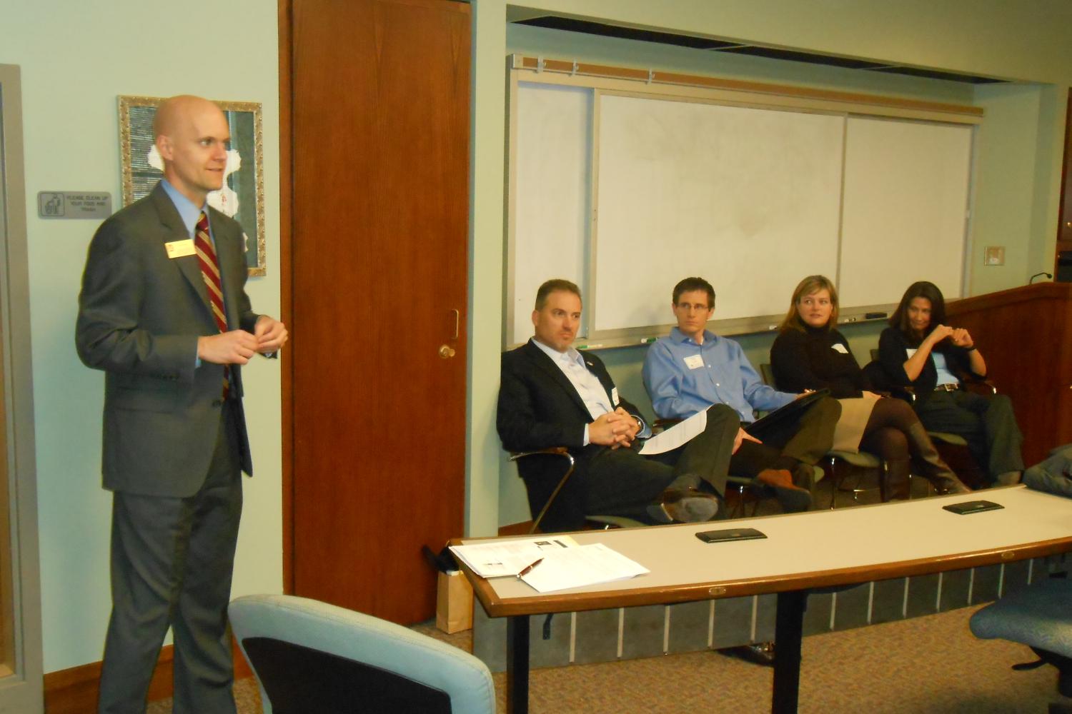Todd Rogers moderates as Shawn Cheadle (Lockheed Martin Space Systems), Tim Kraft (Boulder Brands), Linda McConnon (Corporate Express), and Erica Tarpey (Ireland Stapleton) speak at the Transactional Law Panel.