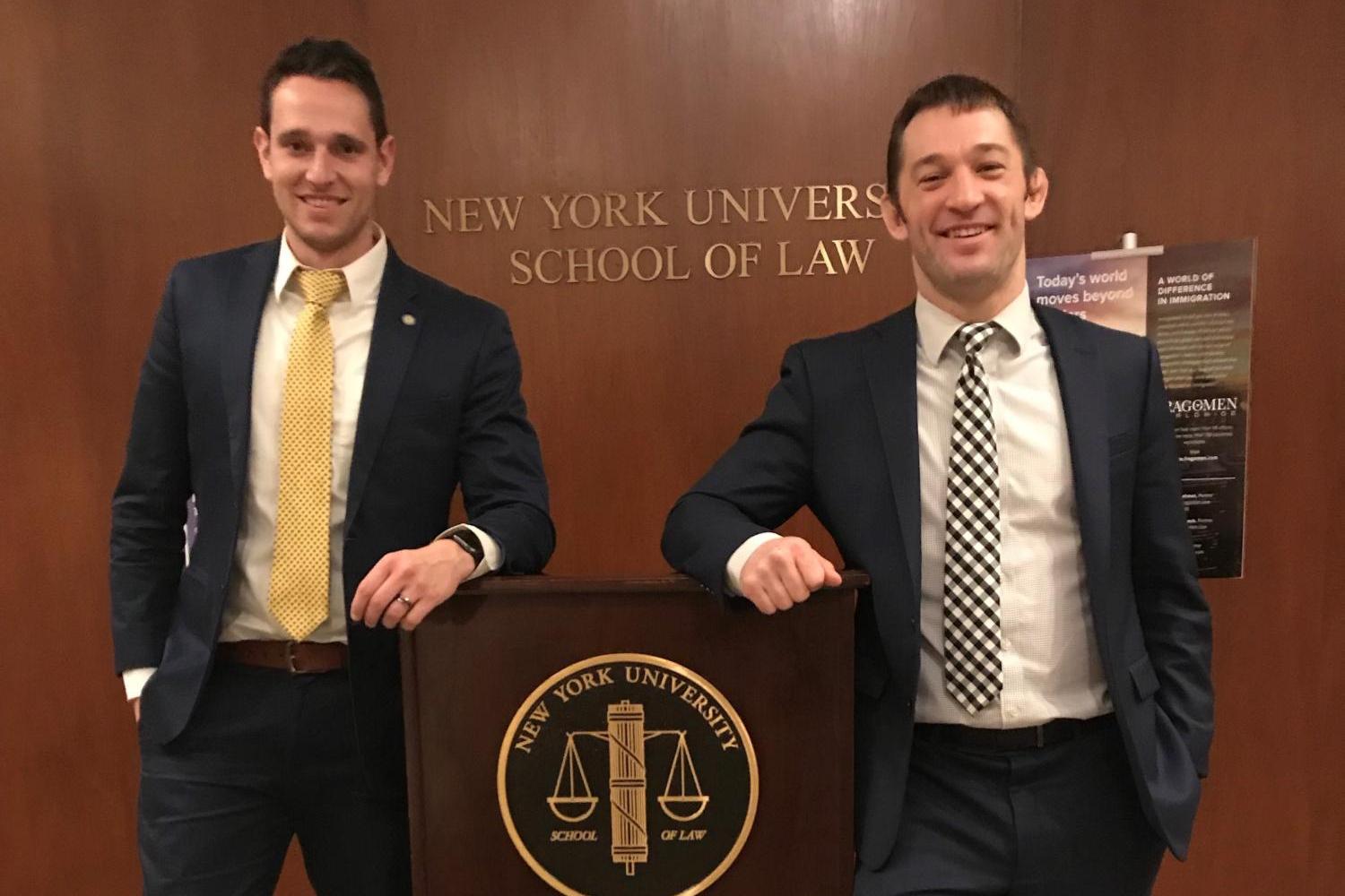 Photo of Travis Weiner and Adam Zenger at NYU Immigration Law Competition