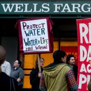 Dakota Access Pipeline protestors organize outside of a Wells Fargo 