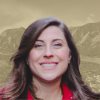 Headshot of Professor Amanda Parsons on graphic background
