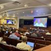 Folks gather in the Wittemyer Courtroom for the first day of the GWC conference.