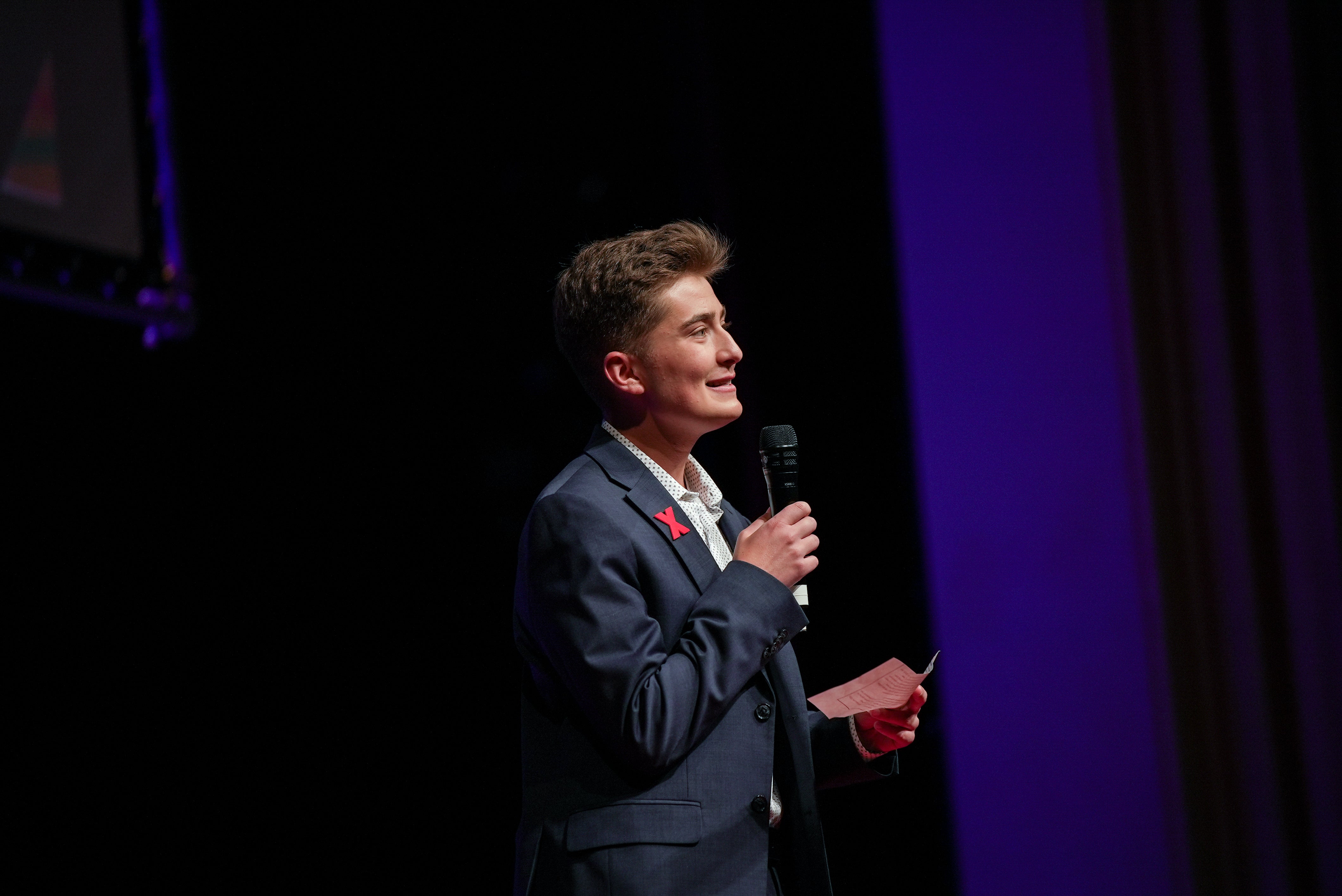 Kalen Sieja Speaking into a microphone