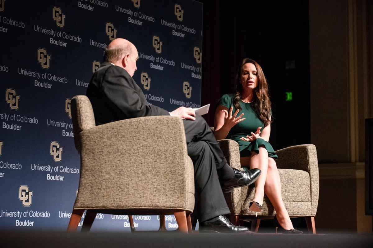 Molly Bloom talking to Phil DiStefano on stage