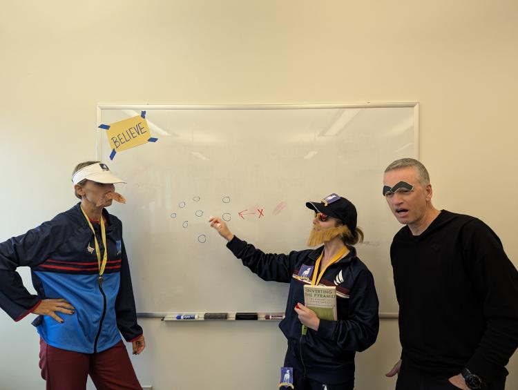 Center for Leadership staff dressed as Ted Lasso, Coach Beard, and Roy Kent