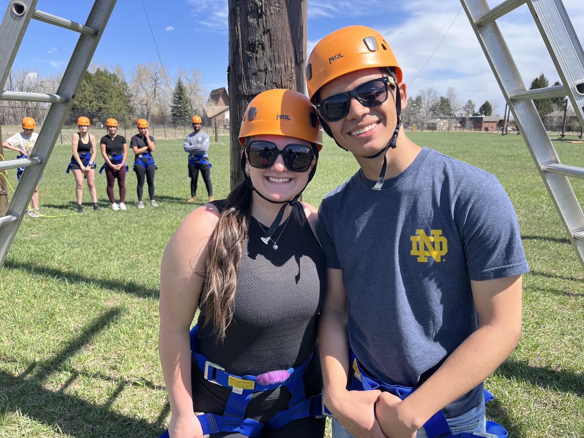 Students in hard hats at the CU Boulder ropes course