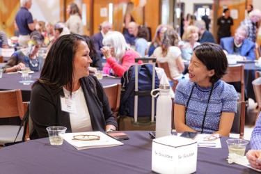Attendees from The Colorado Needs event mingle with attendees of the International Leadership Association's Future Forward Leadership Summit