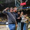 Graduating Leaders of the Year cheer on the basketball court
