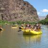CU Boulder students rafting in a canyon