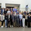 Group of CU Boulder students pose with David Adelman