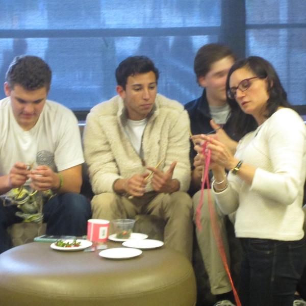 students learn to knit from Dr. Tiel Lundy