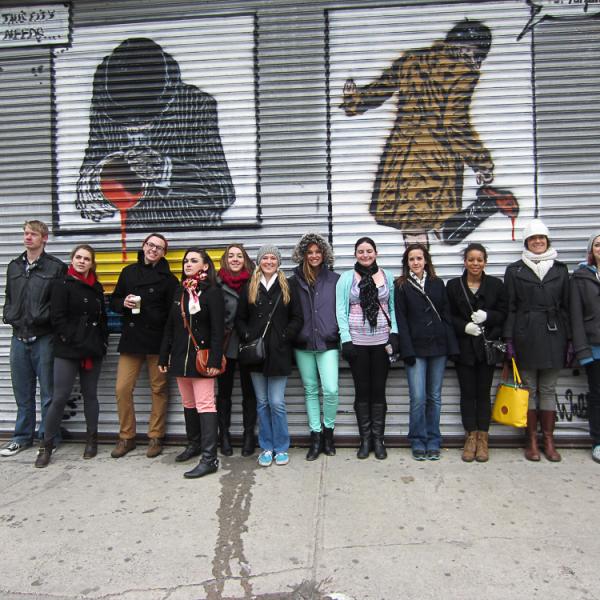 Libby RAP students in front of murals in NYC