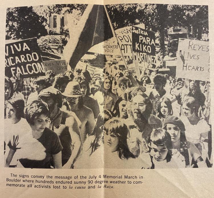 Photo in newspaper depicting students marching in commemoration of the people killed