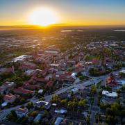 A sunrise aerial photo of campus taken by Glen Asakawa in 2021.